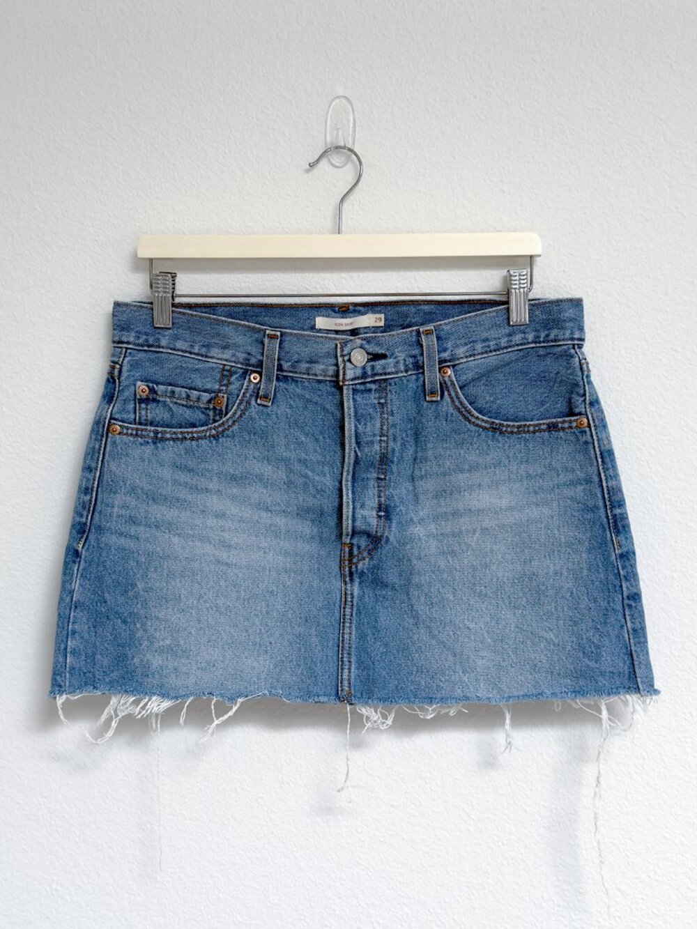 Levi’s Icon Light Wash Denim Mini Skirt Raw Hem Size 29
